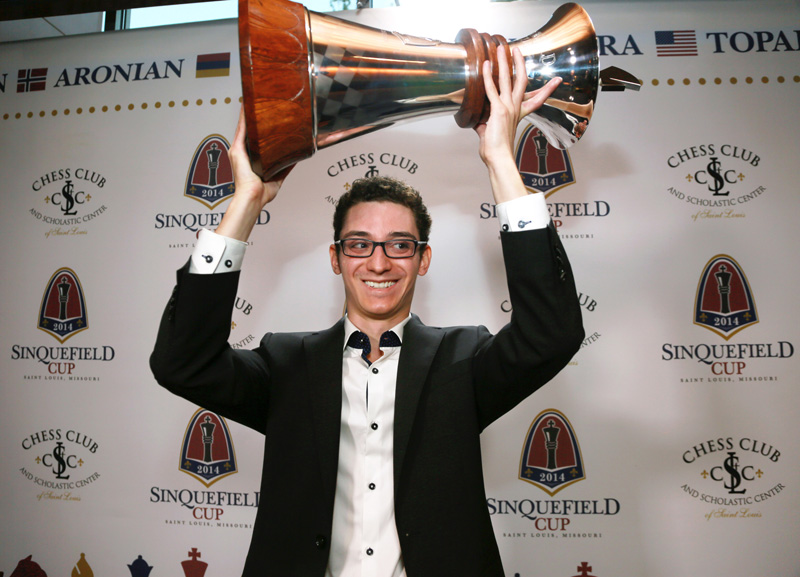 Fabiano Caruana Holding the Sinquefield Cup Trophy at the Awards Ceremony at the Chess Club and Scholastic Center of Saint Louis