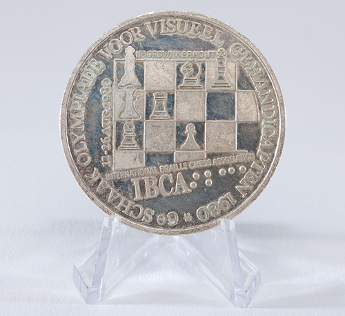 Michael Garner's Silver Medal from the 1980 Blind Chess Olympiad