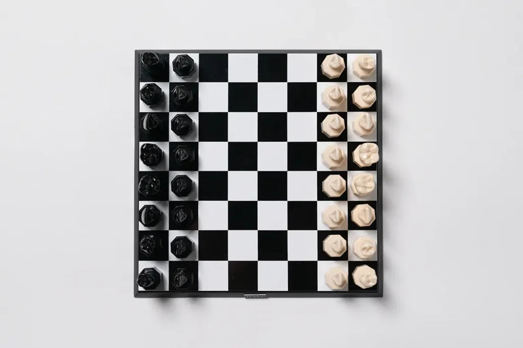 Close-up of the unique Teeth Chess Set from the World Chess Hall of Fame & Galleries, featuring human teeth-shaped pieces on a chessboard.