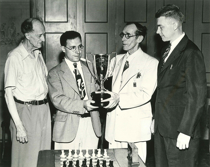 The George Sturgis Trophy Being Presented to Anthony Santasiere, Winner of the 1945 Peoria, IL, U.S. Open Chess Championship The George Sturgis Trophy Being Presented to Anthony Santasiere, Winner of the 1945 Peoria, IL, U.S. Open Chess Championship