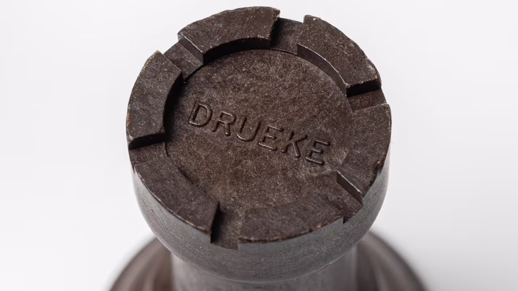 Close-up of the Drueke stamp on the top of an Imperial Player’s Choice rook
